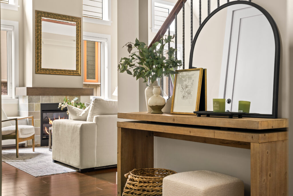 Stunning home staging, Abbotsford sellers will love featuring warm tones, wood pieces for soft texturing and hints of green